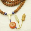 Vajra Mala Pendant Close-up｜Mammoth Ivory Guru Bead with Nanhong & Dual Tassels (Jade+Wood Beads)