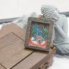 Mineral Pigment Acala Thangka in Zen Setting - Tibetan Buddhist Protective Artwork (3.5x4.5cm) Displayed with Miniature Buddha Statue and Cherry Blossom in Dry Landscape Arrangement